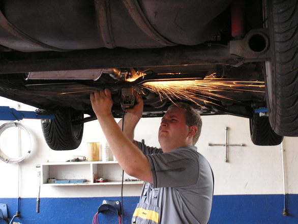 Man fixing a car