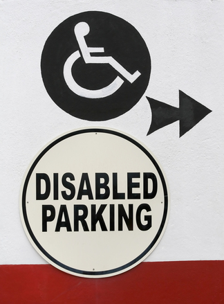 Disabled parking sign, displaying a wheel chair